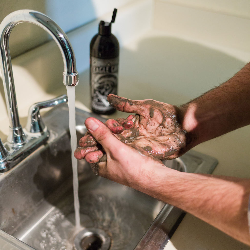 Eagle Grit hand cleaner in use at a workshop sink